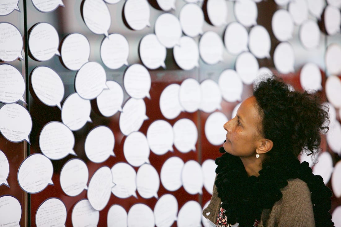 Woman looking at speech bubbles